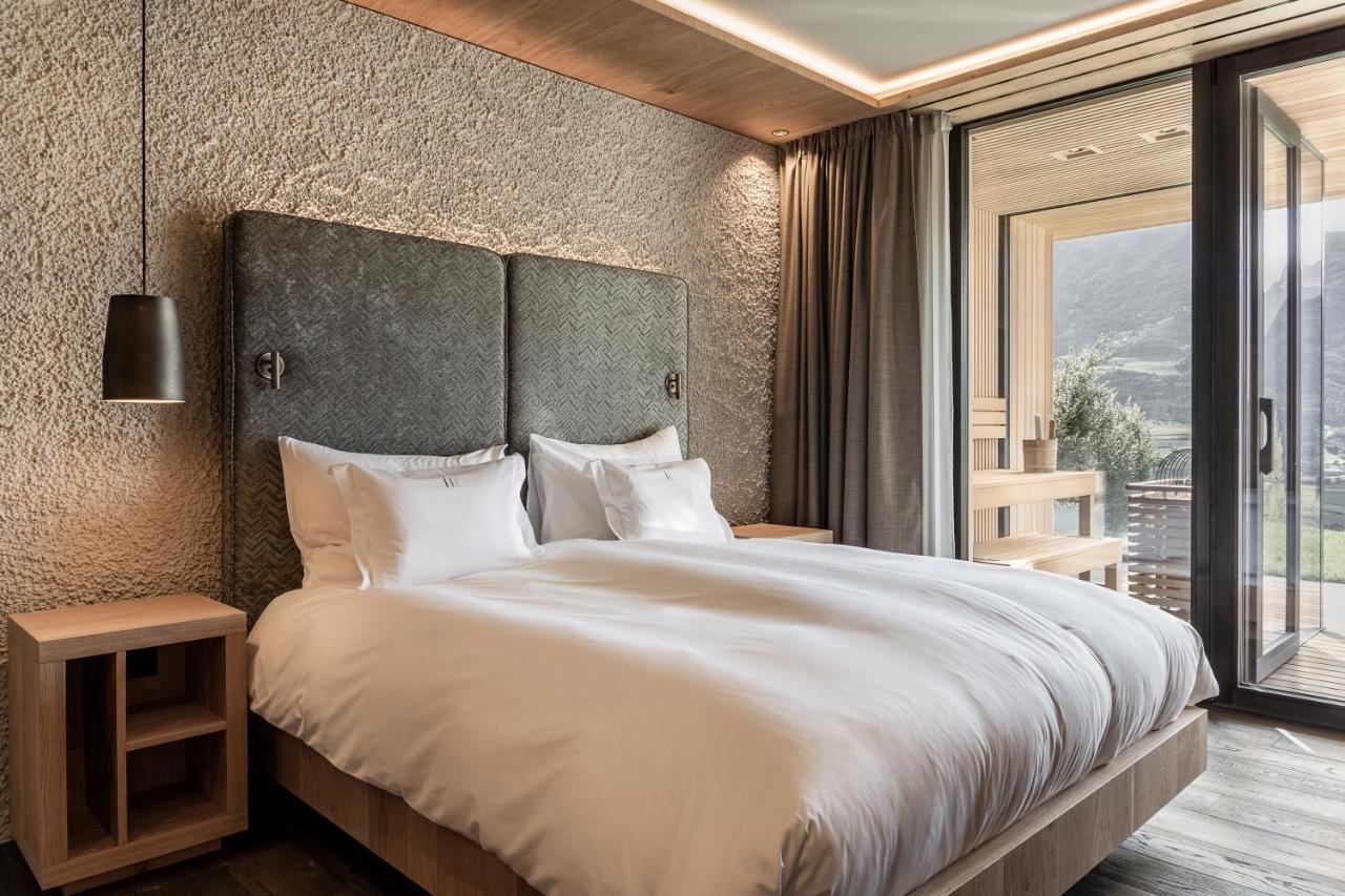 Santre Dolomythic Home ブレッサノーネ エクステリア 写真 A bedroom at the Hotel