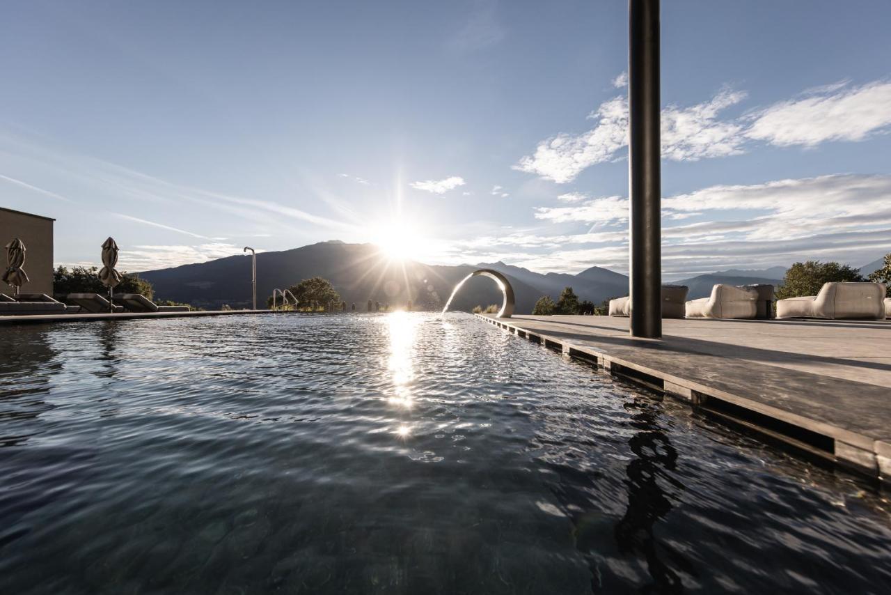 Santre Dolomythic Home ブレッサノーネ エクステリア 写真 The outdoor pool at the AQUAVIA spa