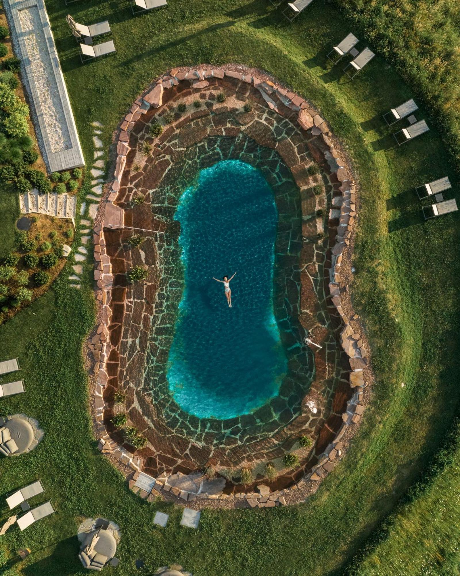 Santre Dolomythic Home ブレッサノーネ エクステリア 写真 Aerial view of the pool